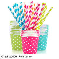 Paper cups and striped straws